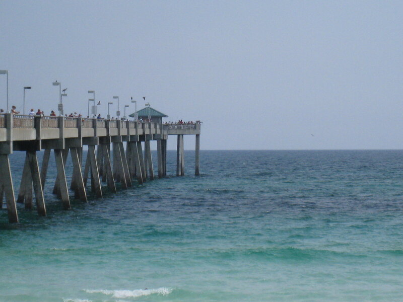 Pier Extending into Ocean — Blue, Calm