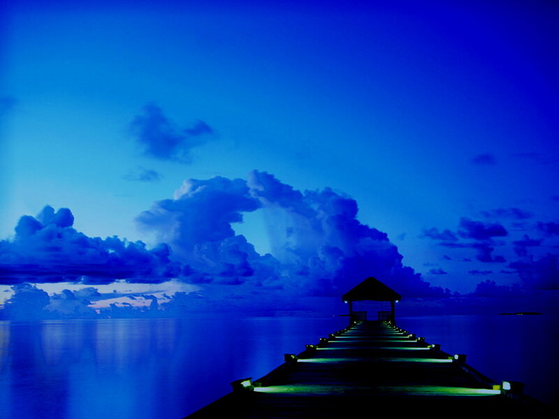 Pier Extending into Ocean — Blue, Serene, Night