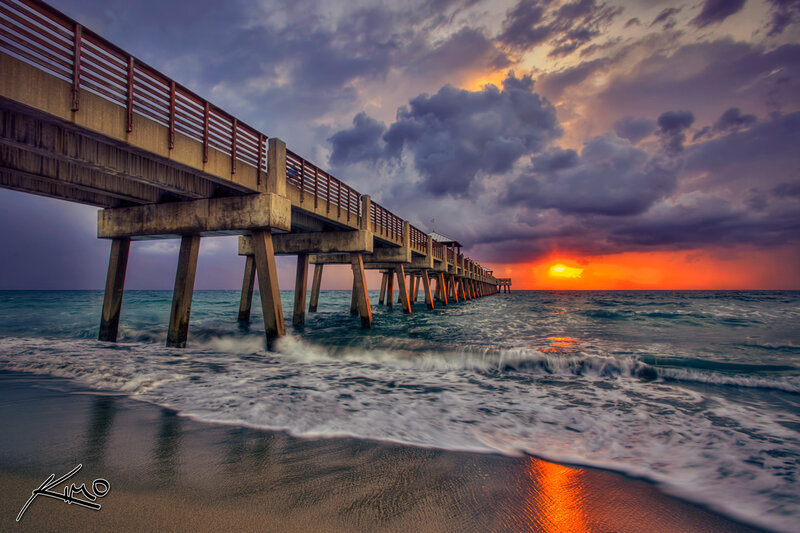 Pier Extending into Ocean — Orange
