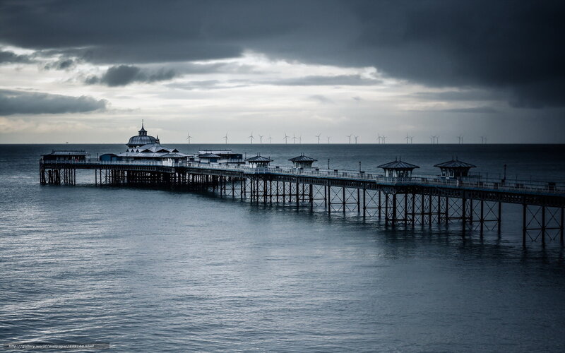 Pier Extending into Sea — Blue, Dramatic