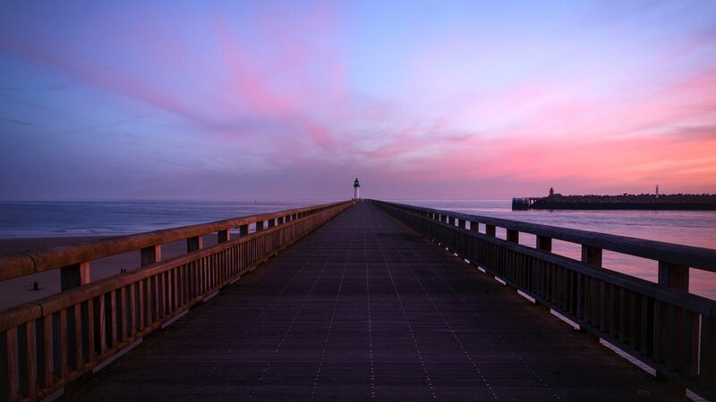 Pier Extending to Lighthouse