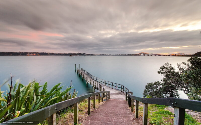 Pier leading to a calm bay