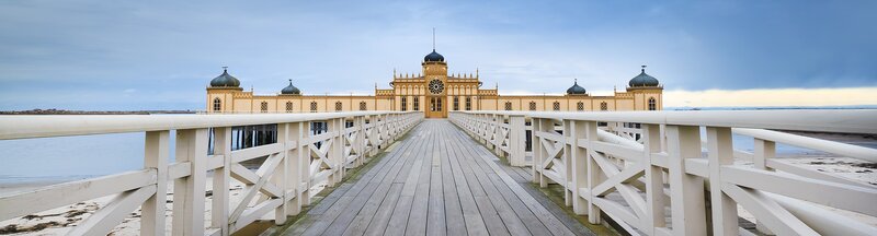 Pier leading to a historic building