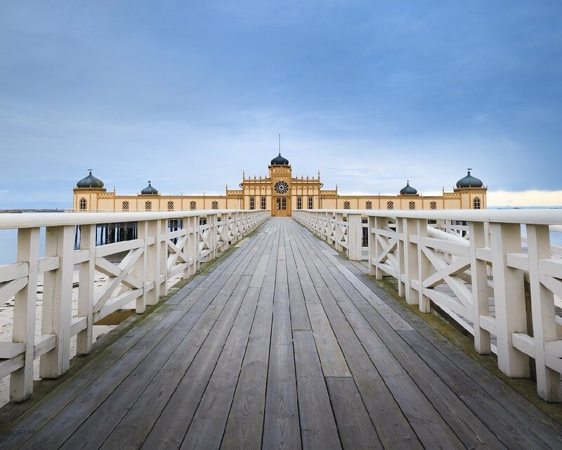 Pier leading to a historic building