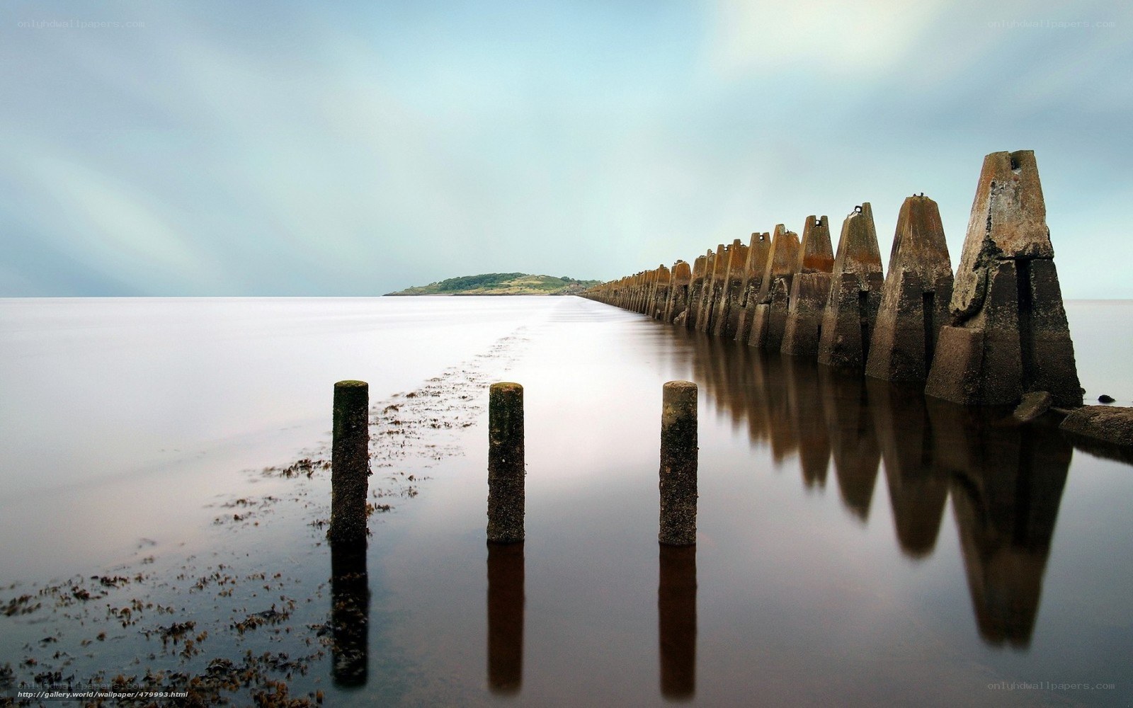Pier leading to distant island