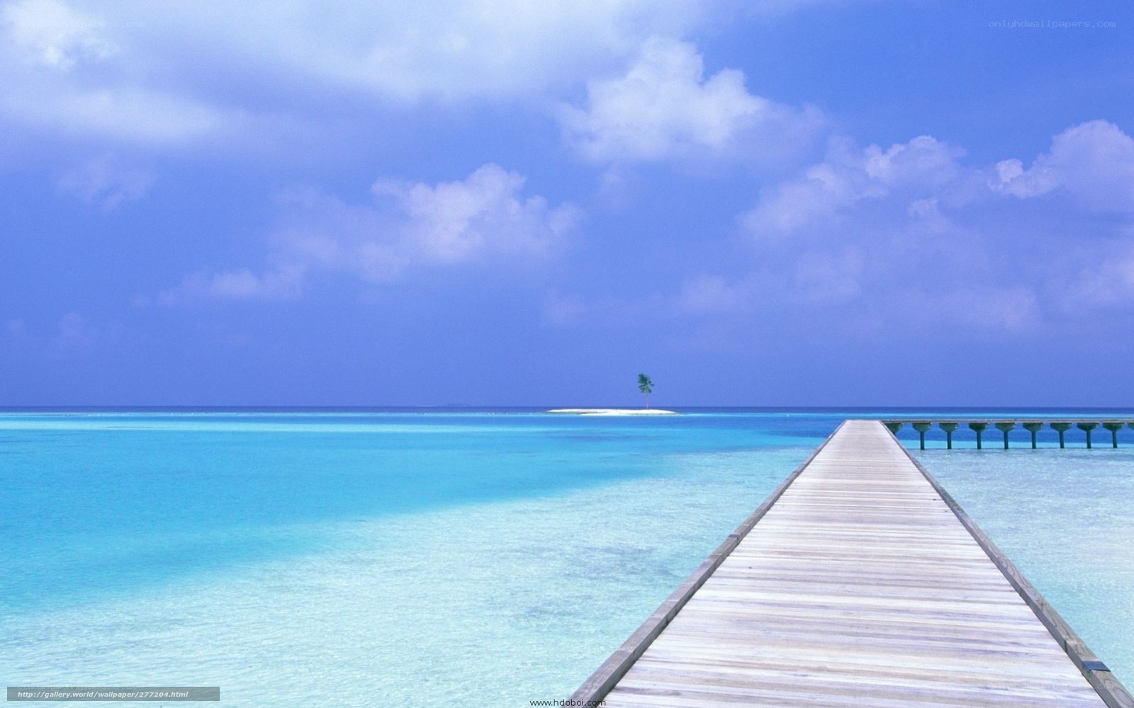 Pier leading to tropical island