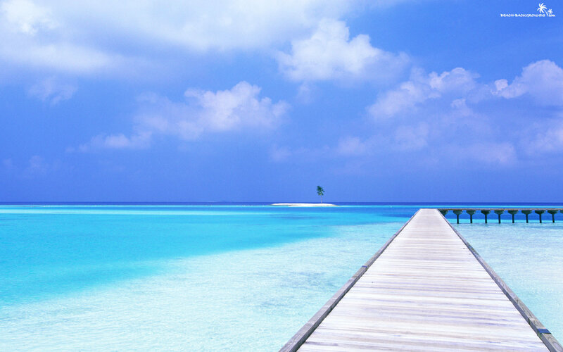 Pier leading to tropical island