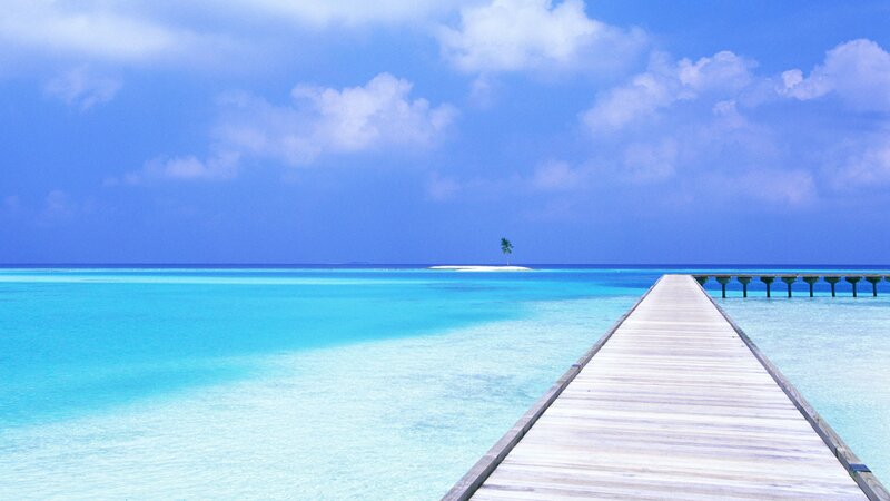 Pier leading to tropical island