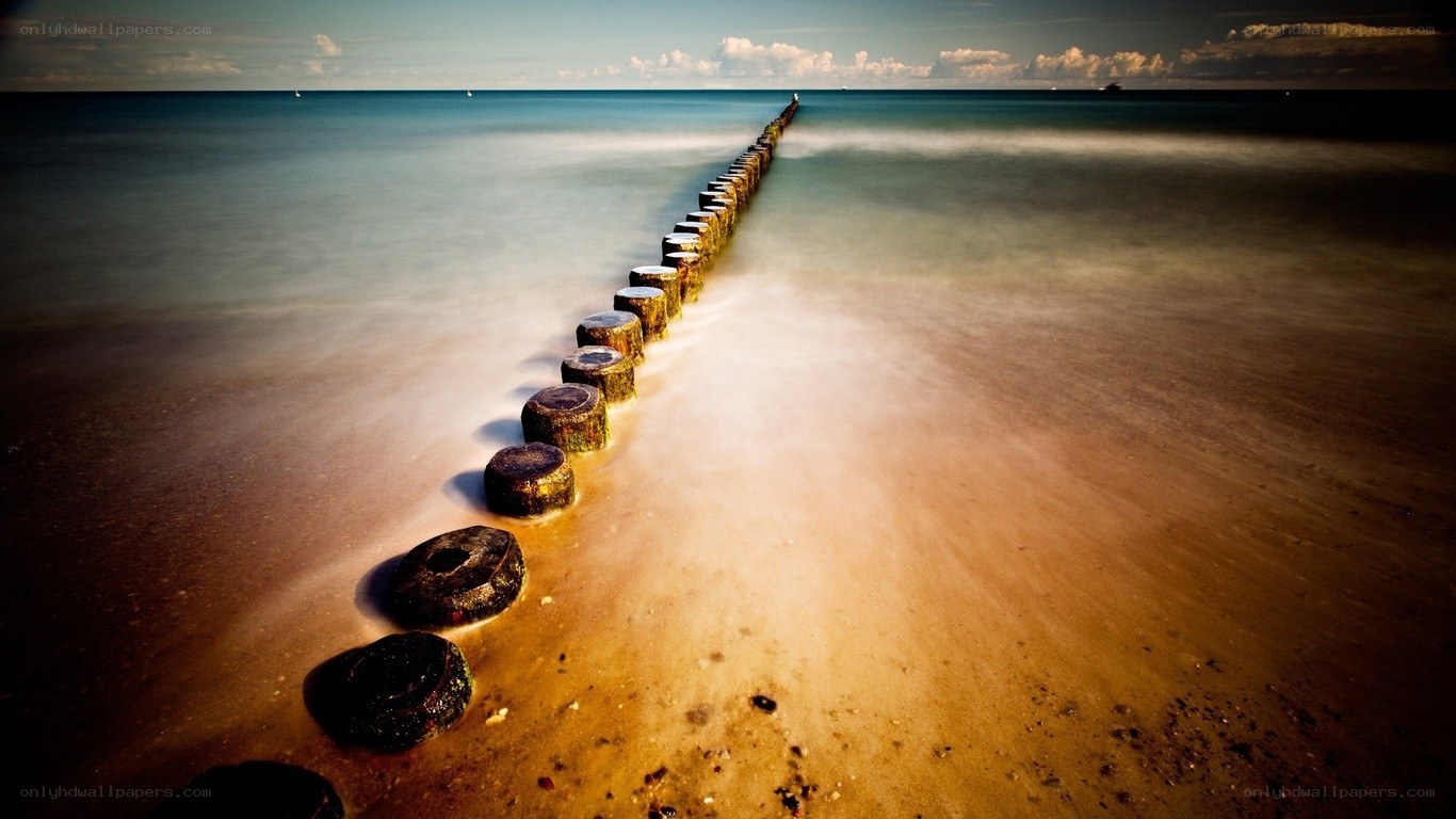 Pier on a calm beach