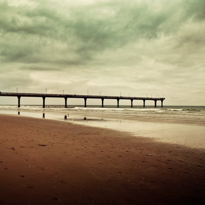 Pier on a cloudy beach day