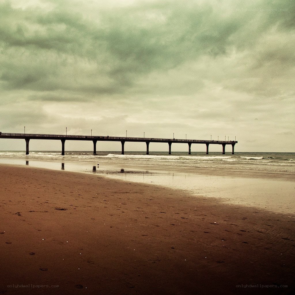 Pier on a cloudy beach day