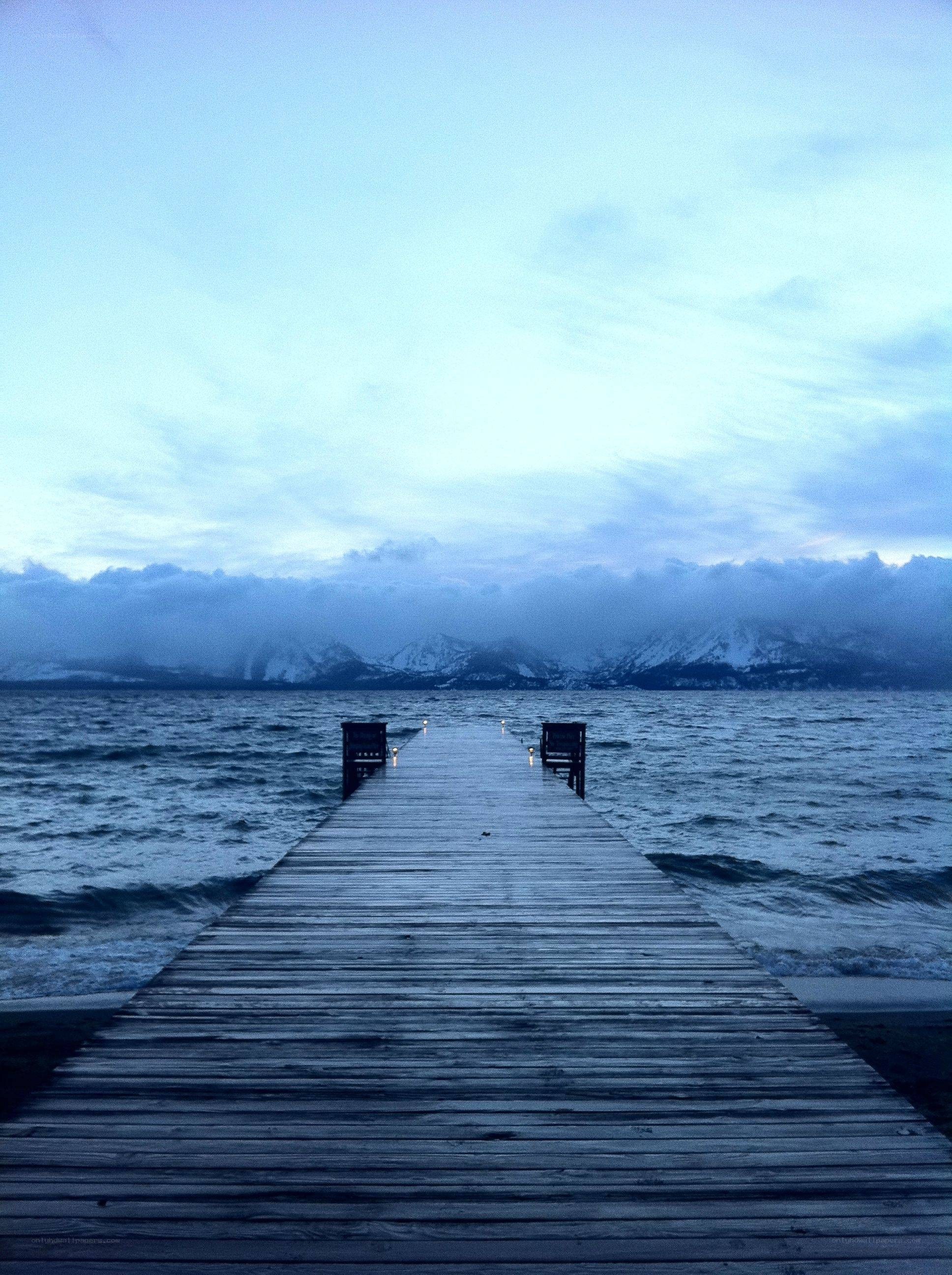 Pier on a lake at dusk