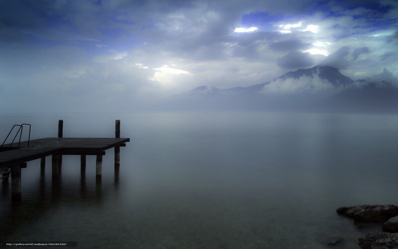 Pier on a misty lake