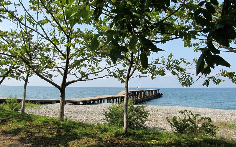 Pier on a pebble beach