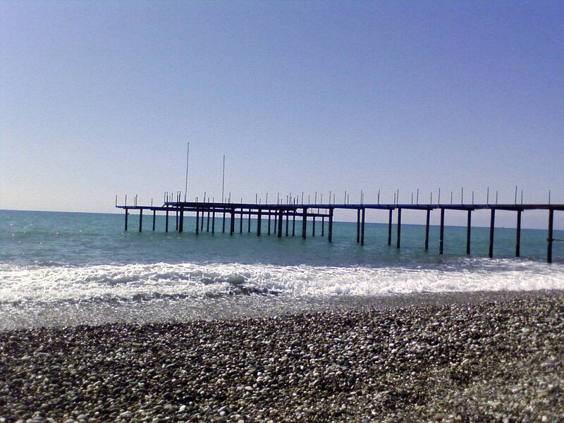 Pier on a pebble beach