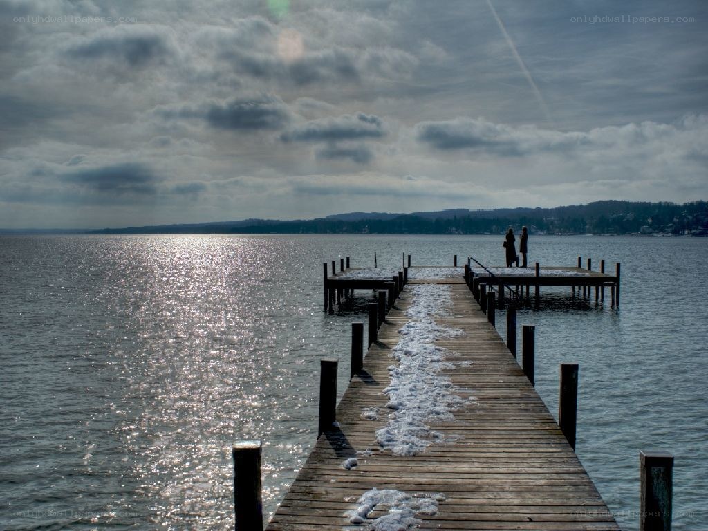 Pier on a snowy lake