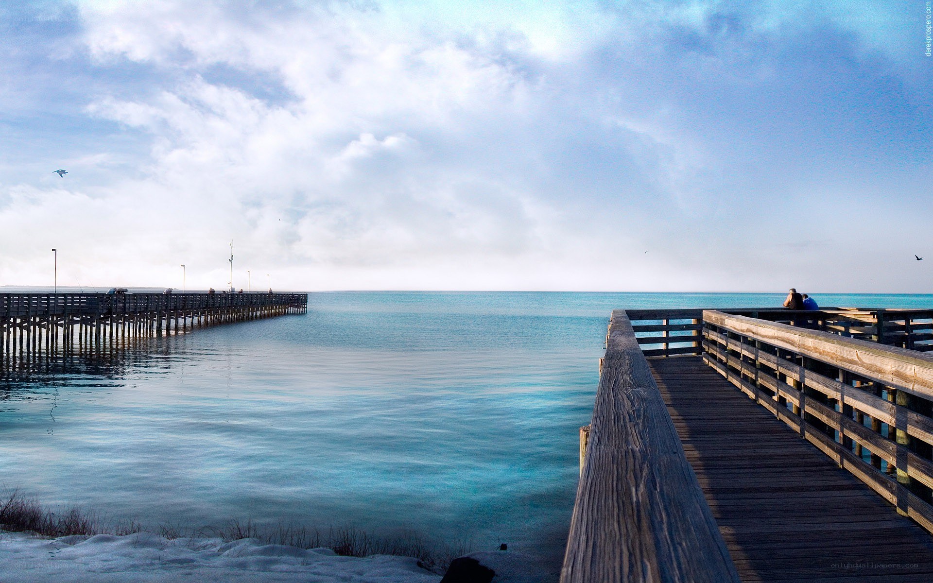 Pier over calm blue water