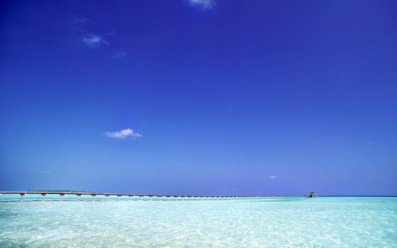 Pier over turquoise water