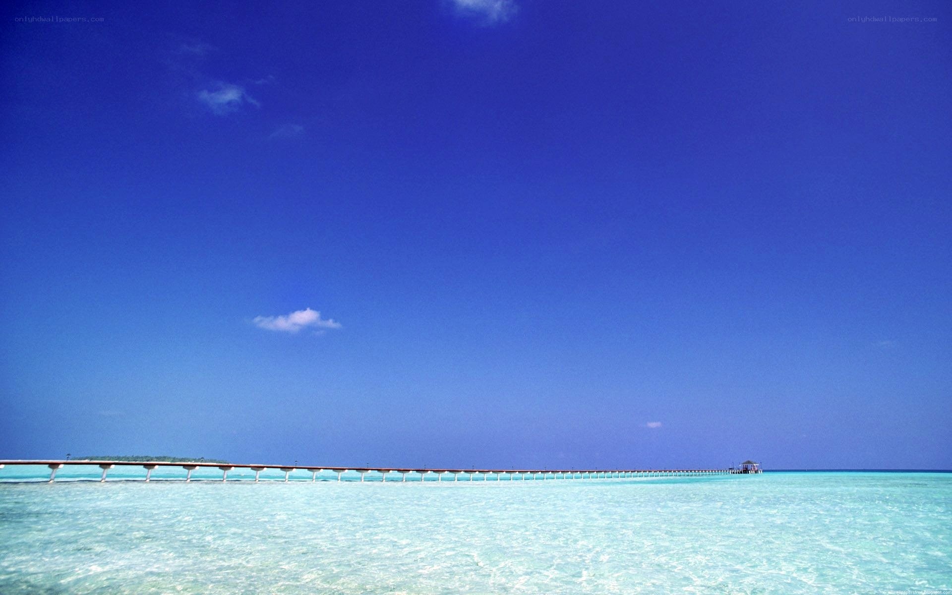 Pier over turquoise water