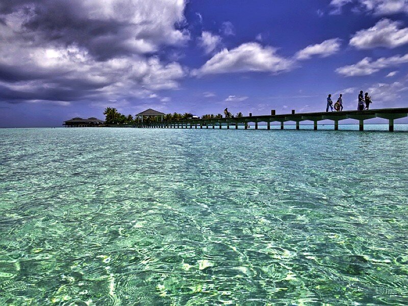 Pier over turquoise water