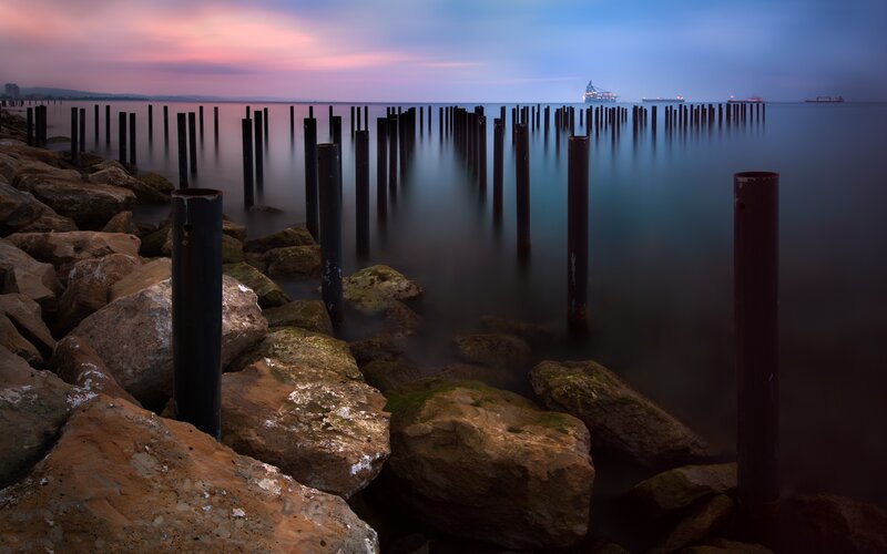Pier pilings at dusk