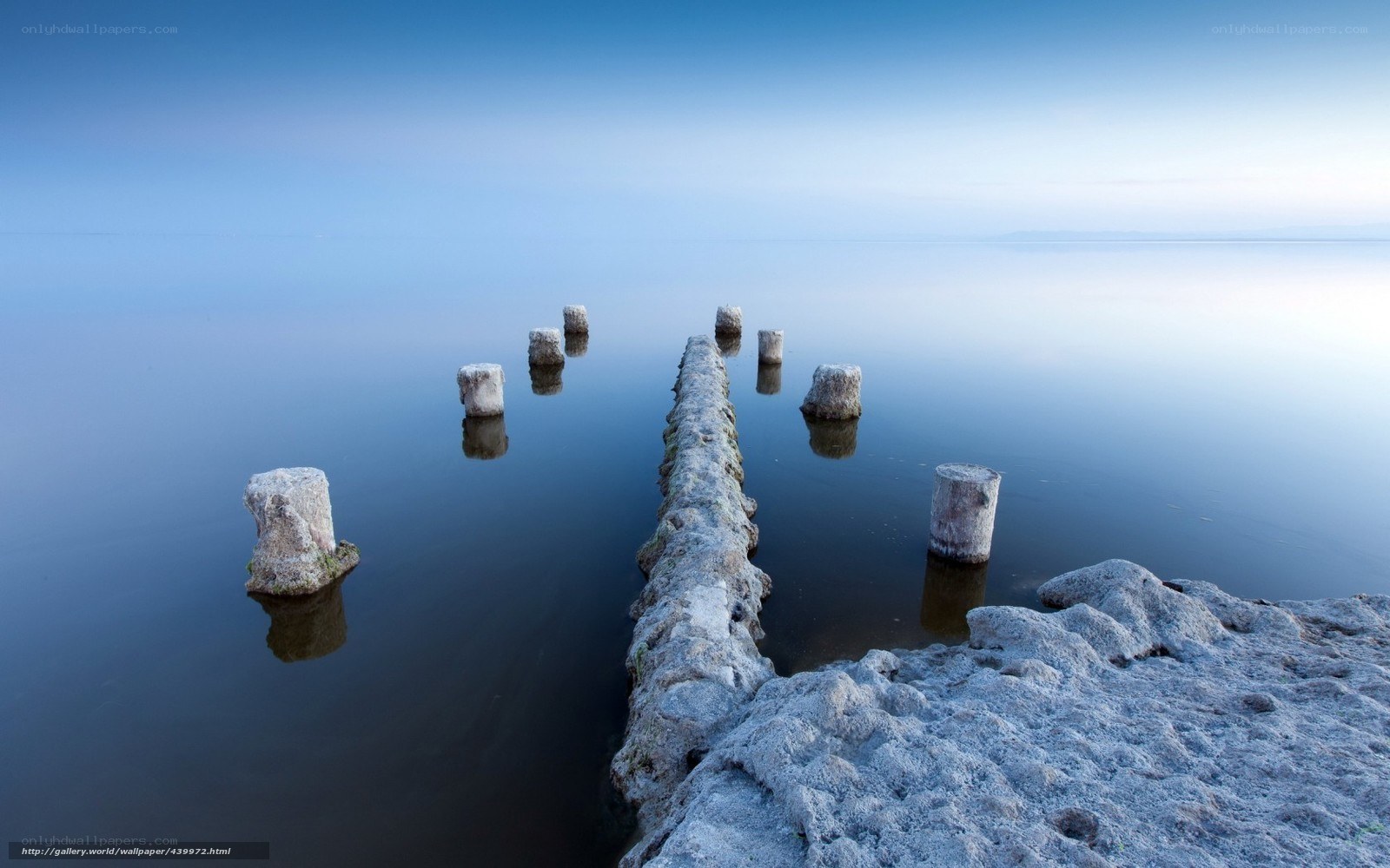 Pier pillars in calm water