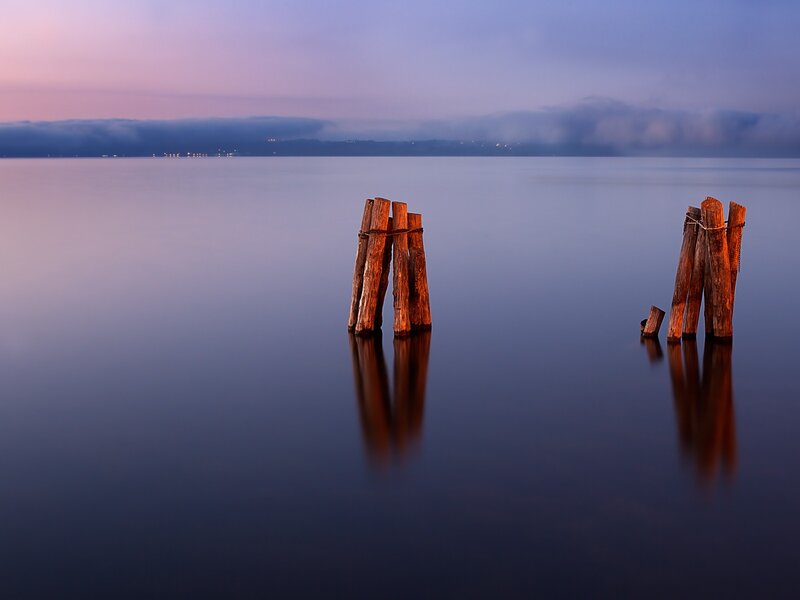 Pier posts at dusk