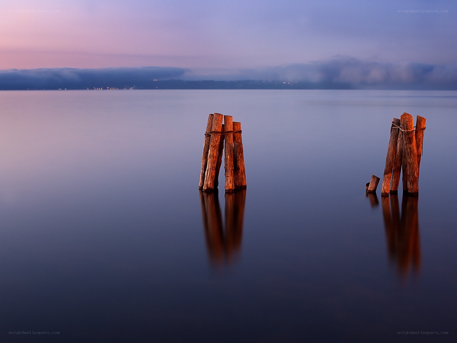 Pier posts at dusk