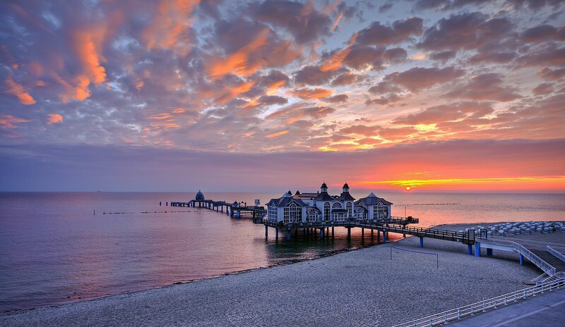 Pier with Building at Sunset — Orange