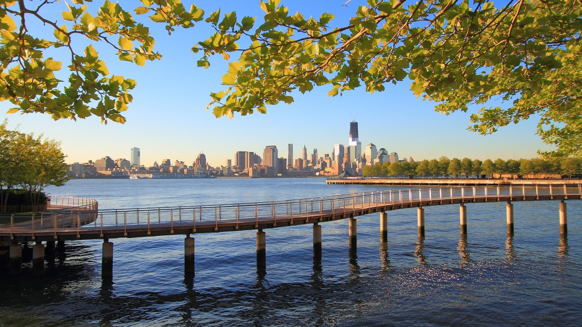 Pier with city skyline view