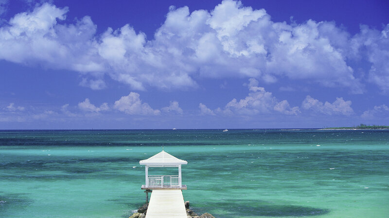 Pier with gazebo in turquoise water