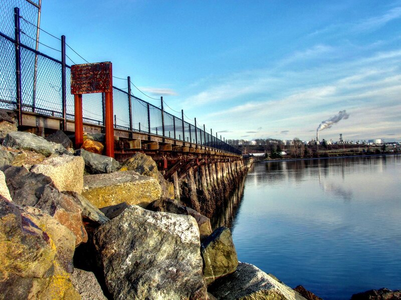 Pier with industrial backdrop