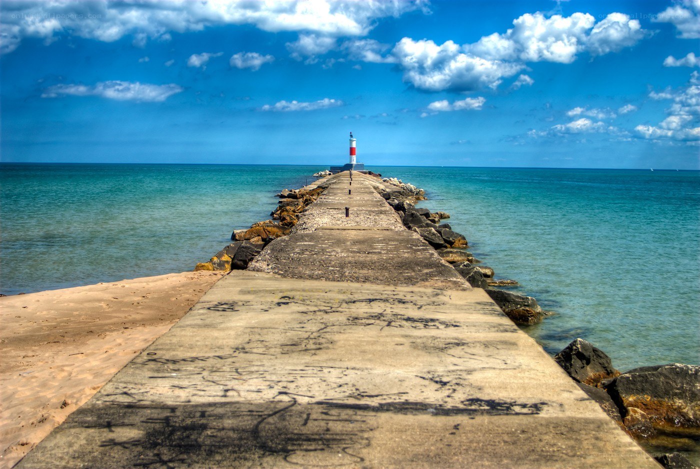 Pier with lighthouse at end
