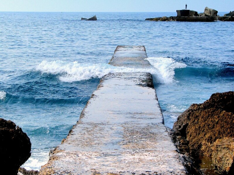 Pier with waves crashing