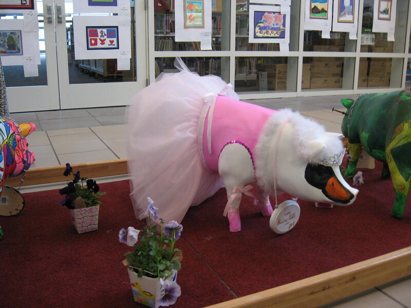 Pig sculpture in pink tutu