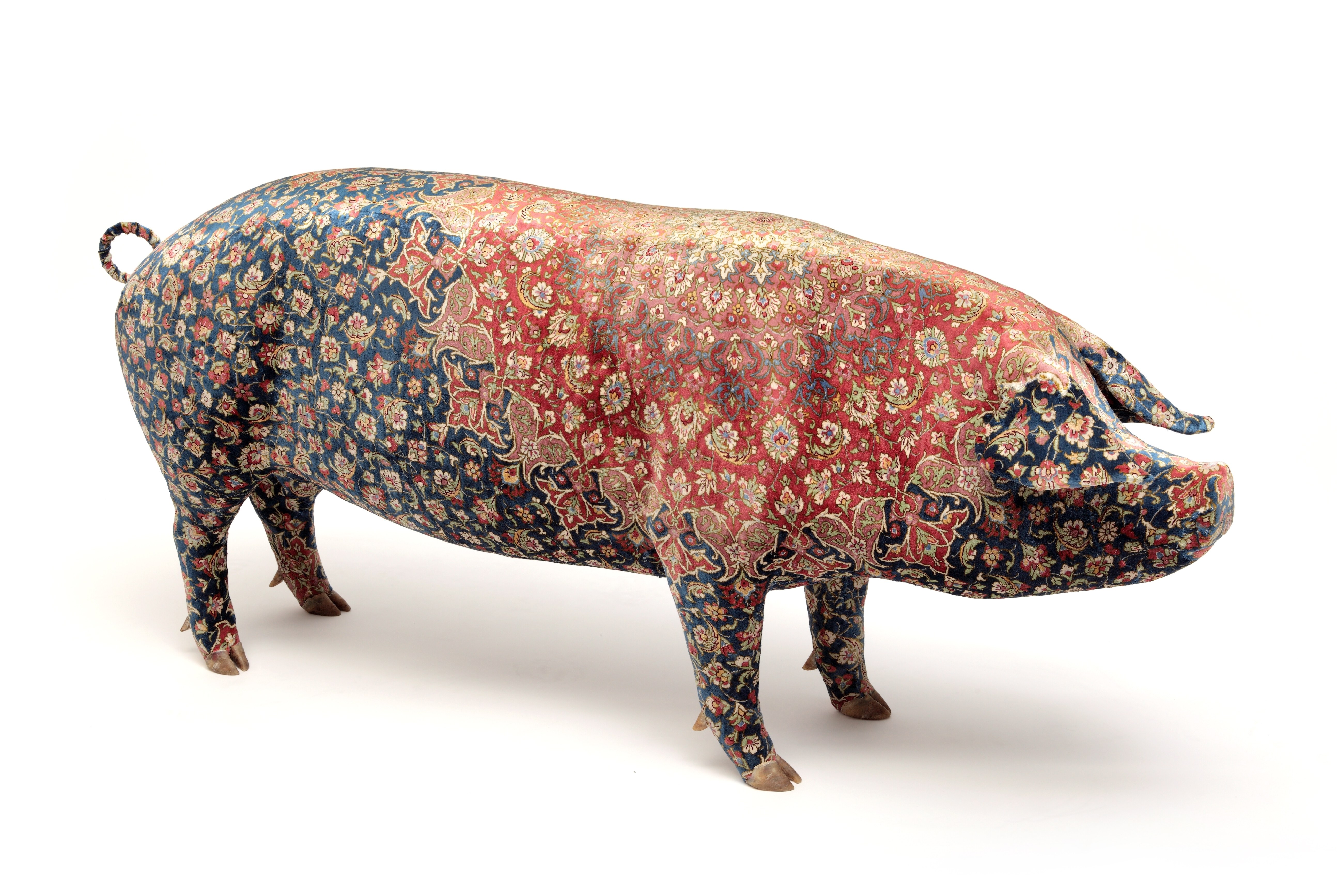 pig sculpture with patterned fabric