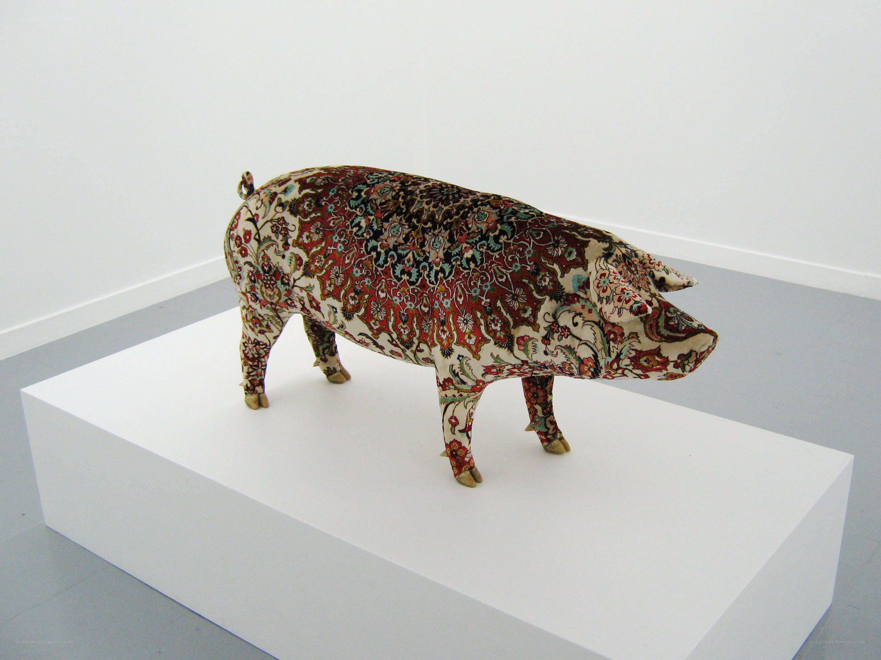 pig sculpture with patterned fabric