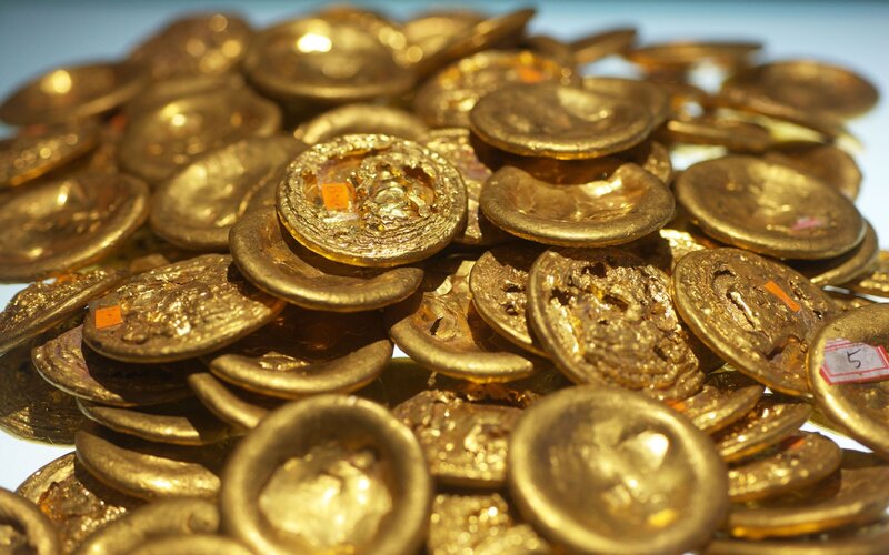 pile of ancient gold coins
