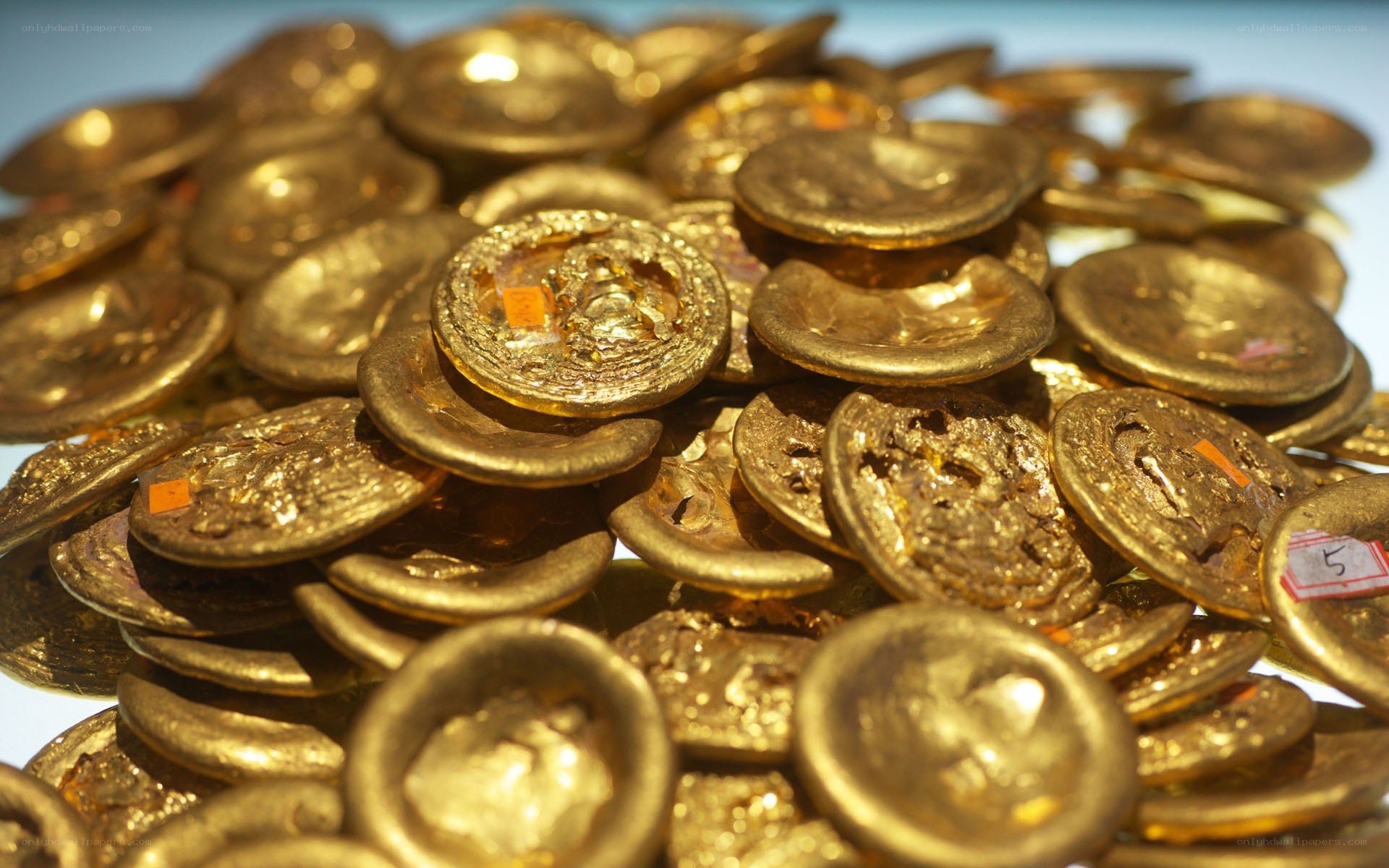 pile of ancient gold coins