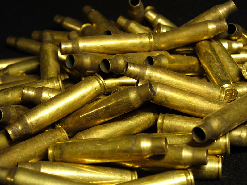 Pile of brass bullet casings
