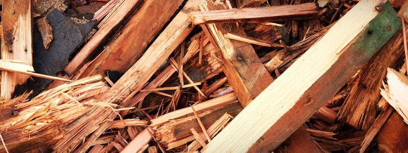 pile of broken wooden planks