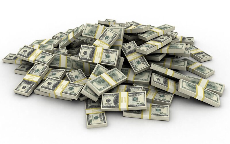pile of hundred dollar bills
