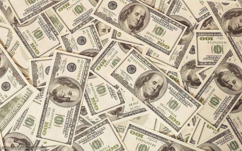 pile of hundred-dollar bills