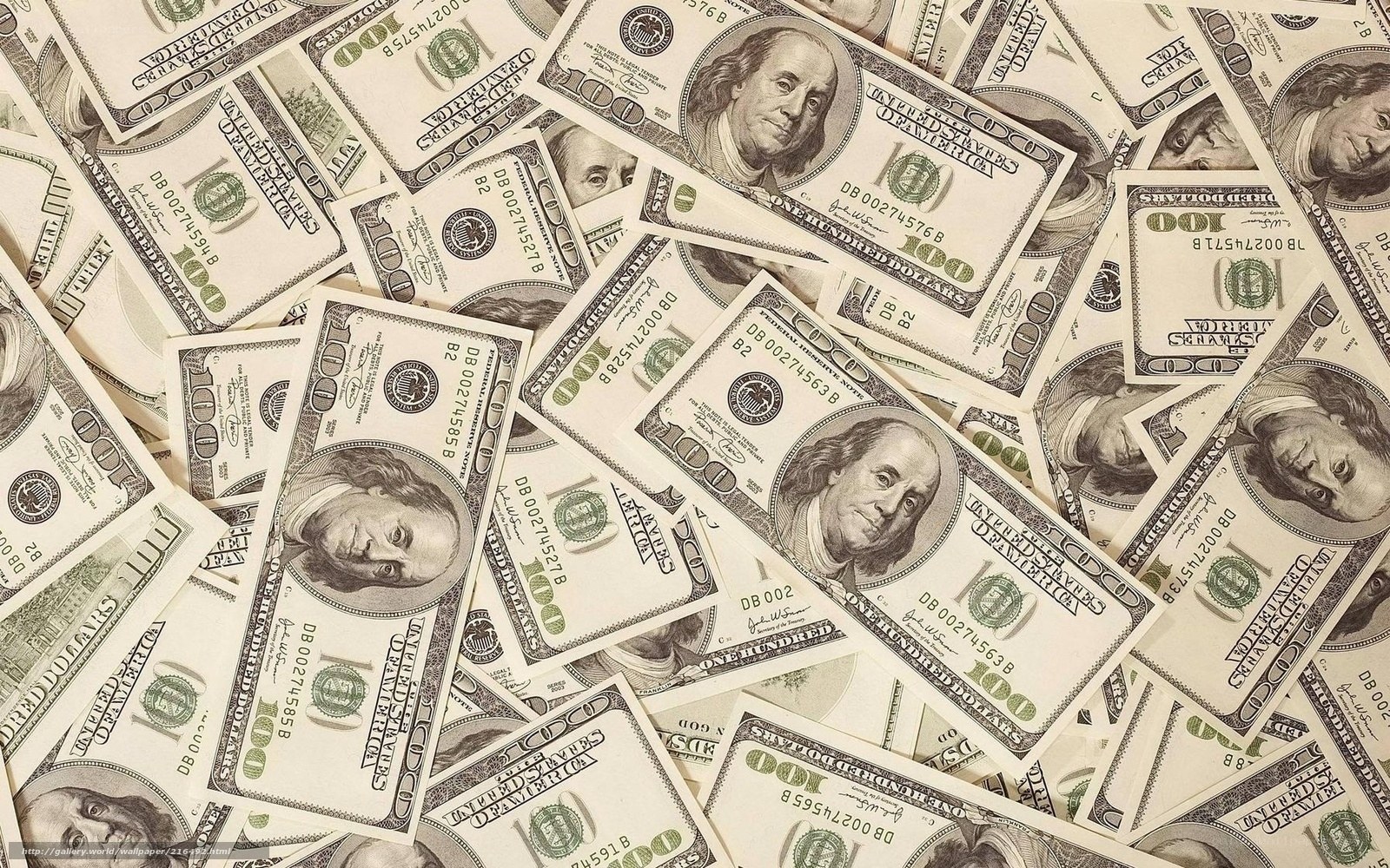 pile of hundred-dollar bills
