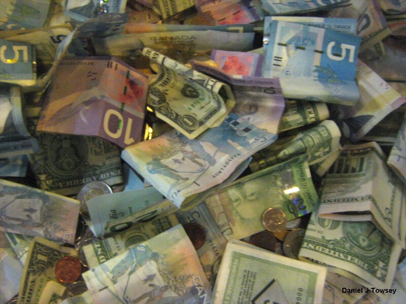 pile of mixed currency bills