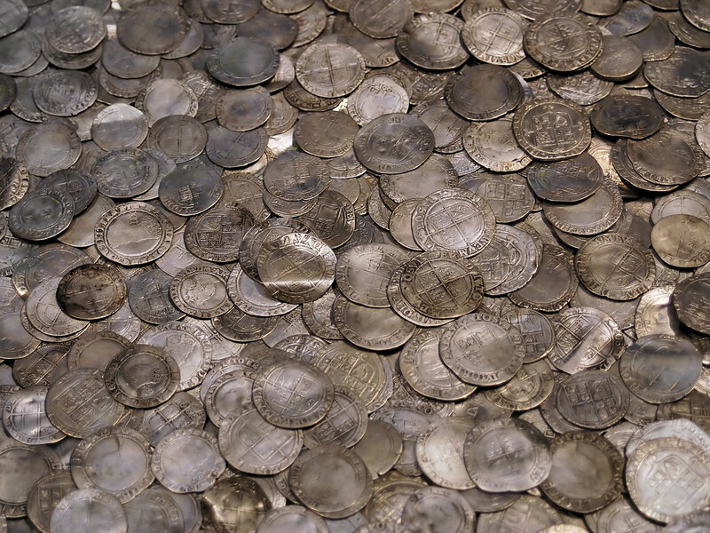 pile of old silver coins