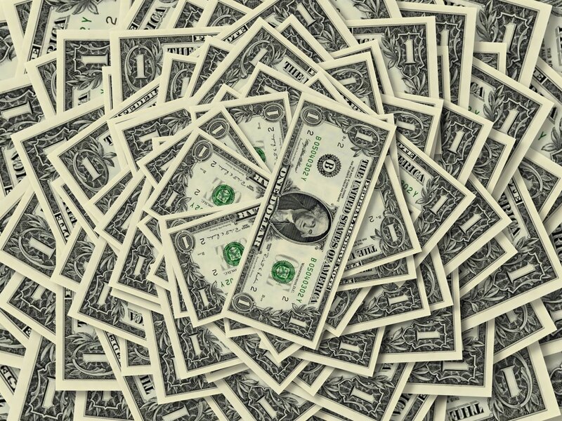 pile of one-dollar bills