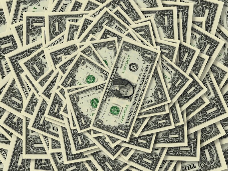 pile of one-dollar bills