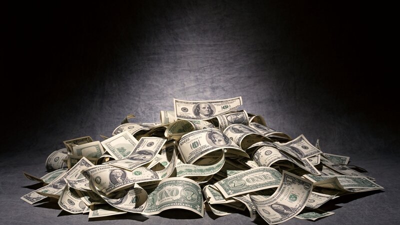 pile of US dollar bills