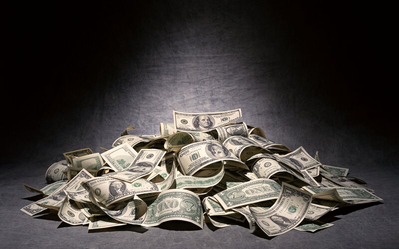 pile of US dollar bills